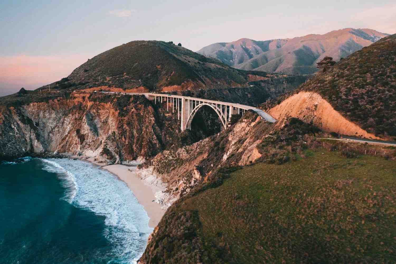 A dramatic cliffside view of the Pacific Coast Highway.